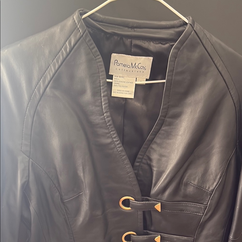 Pamela McCoy Black Leather Jacket with Sleek Modern Cut